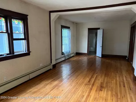 Living - 309 S Pleasant St, Belding, MI 48809 photo 1 of 7
