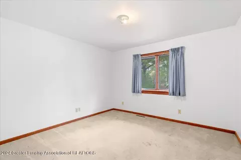 Bedroom - 5401 Ann Dr, Bath, MI 48808 photo 2 of 4
