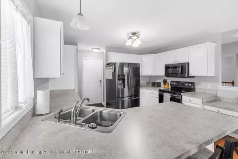 Kitchen - 12930 S Grange Rd, Eagle, MI 48822 photo 2 of 3