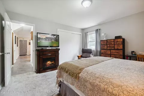 Bedroom - 13121 Tucker Dr, Dewitt, MI 48820 photo 4 of 9