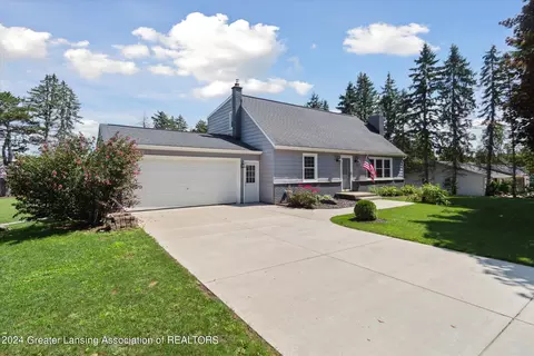 Exterior - 13121 Tucker Dr, Dewitt, MI 48820 photo 3 of 13