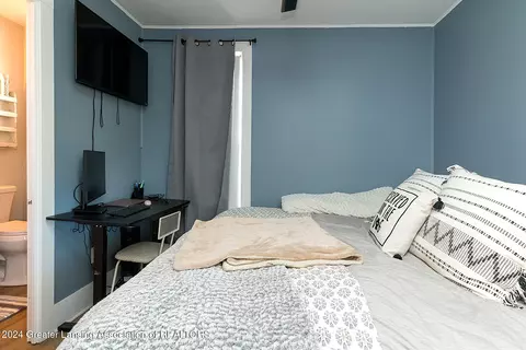 Bedroom - 231 Mechanic St, Mason, MI 48854 photo 1 of 2