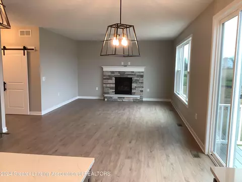 Living - 11800 Kalamata Dr #102, Dewitt, MI 48820 photo 1 of 1