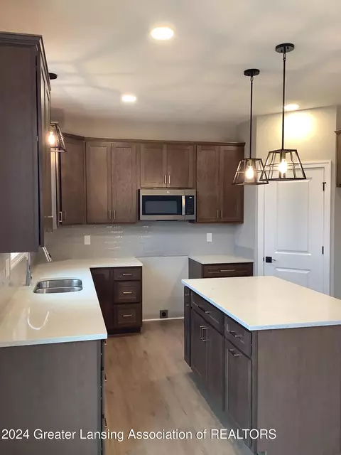 Kitchen - 11800 Kalamata Dr #102, Dewitt, MI 48820 photo 2 of 3