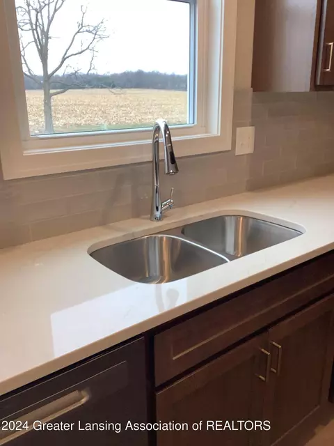 Kitchen - 11800 Kalamata Dr #102, Dewitt, MI 48820 photo 3 of 3