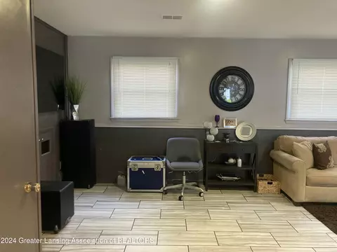 Living - 3025 Cooley Dr, Lansing, MI 48911 photo 3 of 3
