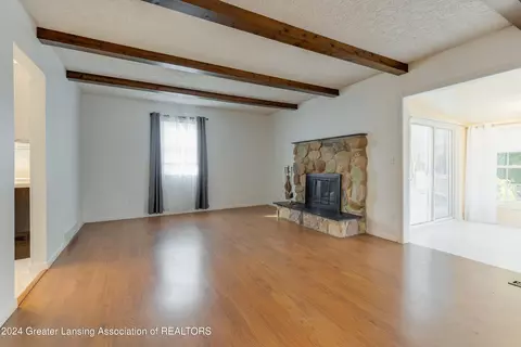 Living - 407 E Herbison Dr, Dewitt, MI 48820 photo 2 of 3