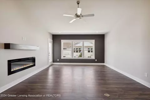 Living - 5302 E Hawk Hollow Dr #34, Bath, MI 48808 photo 3 of 4