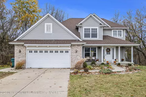 411 Perry Lake Dr, Perry, MI 48872