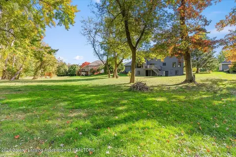 Exterior - 214 Brookstone Cir, Dewitt, MI 48820 photo 9 of 12