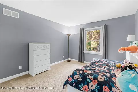 Bedroom - 214 Brookstone Cir, Dewitt, MI 48820 photo 3 of 7