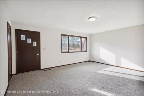 Living - 7019 S Ainger Rd, Olivet, MI 49076 photo 1 of 3