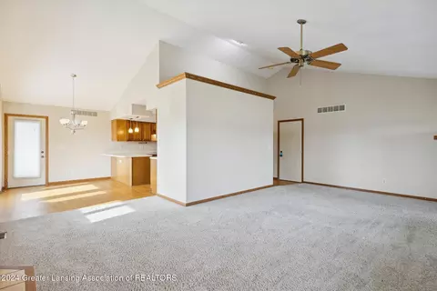 Living - 1787 Killarney Dr, Holt, MI 48842 photo 3 of 4
