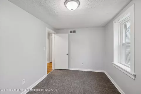 Bedroom - 637 E Willard Ave, Lansing, MI 48910 photo 2 of 2