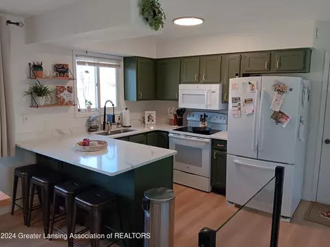 Kitchen - 100 E Haslett Rd, Haslett, MI 48840 photo 3 of 3