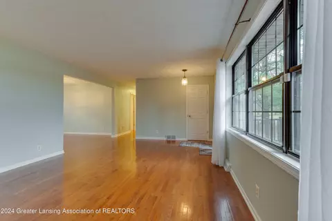 Living - 7444 E Herbison Rd, Bath, MI 48808 photo 4 of 6