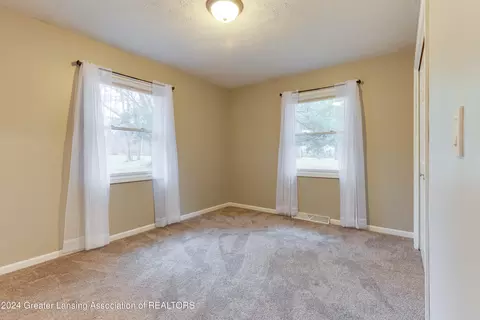 Bedroom - 7444 E Herbison Rd, Bath, MI 48808 photo 4 of 7