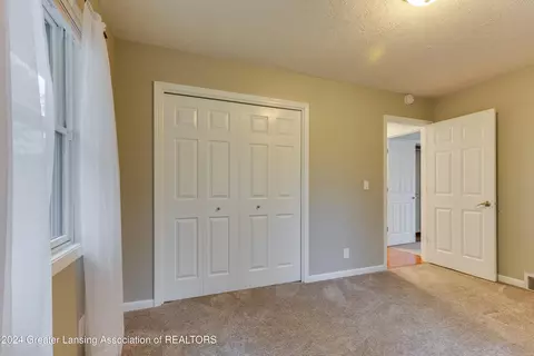 Bedroom - 7444 E Herbison Rd, Bath, MI 48808 photo 5 of 7