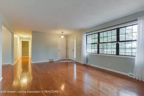 Living - 7444 E Herbison Rd, Bath, MI 48808 photo 3 of 6