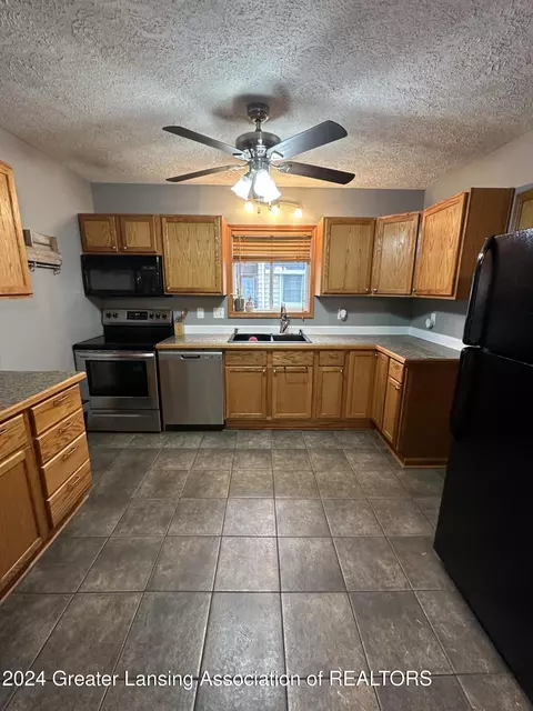 Kitchen - 312 E Cavanaugh Rd, Lansing, MI 48910 photo 1 of 2