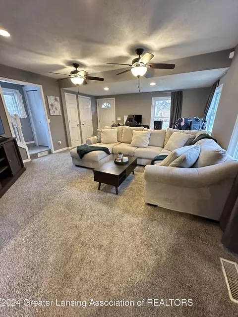 Living - 312 E Cavanaugh Rd, Lansing, MI 48910 photo 1 of 2