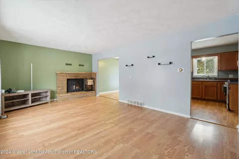 Living - 6401 Marscot Dr, Lansing, MI 48911 photo 3 of 4