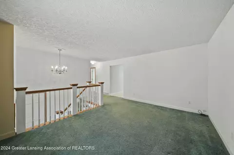 Living - 3325 Luroma Dr, Dewitt, MI 48820 photo 2 of 3