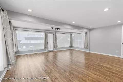 Living - 6239 W Reynolds Rd, Haslett, MI 48840 photo 2 of 3