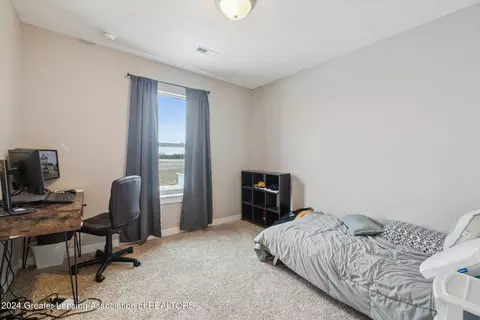 Bedroom - 1767 E Colony Rd, Saint Johns, MI 48879 photo 4 of 7