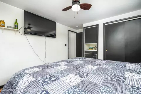 Bedroom - 490 S Nevins Rd, Stanton, MI 48888 photo 2 of 4