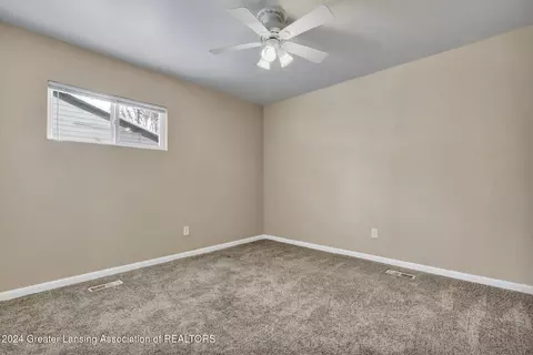 Bedroom - 321 N Dibble Ave, Lansing, MI 48917 photo 4 of 5
