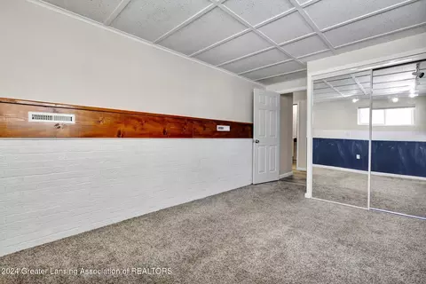 Bedroom - 321 N Dibble Ave, Lansing, MI 48917 photo 1 of 5