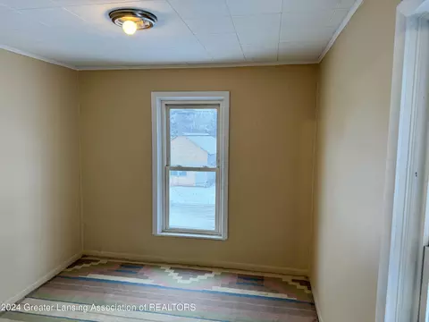 Bedroom - 122 E Third St, Perry, MI 48872 photo 1 of 7