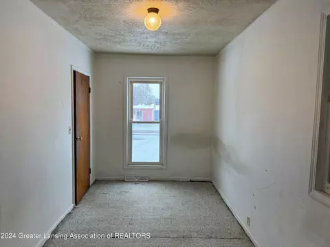 Bedroom - 122 E Third St, Perry, MI 48872 photo 2 of 7