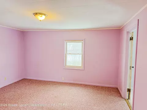 Bedroom - 122 E Third St, Perry, MI 48872 photo 6 of 7