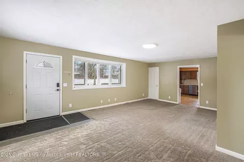 Living - 10281 Stoll Rd, Haslett, MI 48840 photo 1 of 4