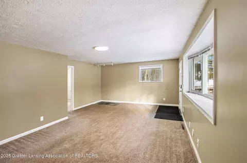 Living - 10281 Stoll Rd, Haslett, MI 48840 photo 4 of 4