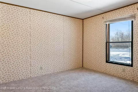 Bedroom - 501 Poplar St, Maple Rapids, MI 48853 photo 6 of 9
