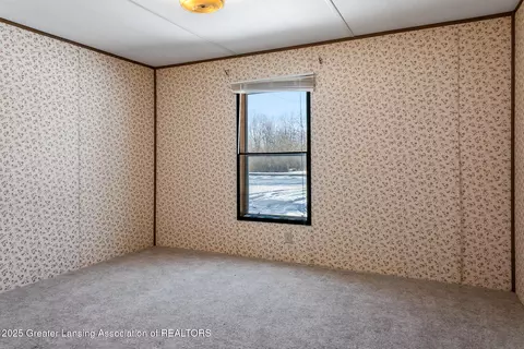 Bedroom - 501 Poplar St, Maple Rapids, MI 48853 photo 7 of 9