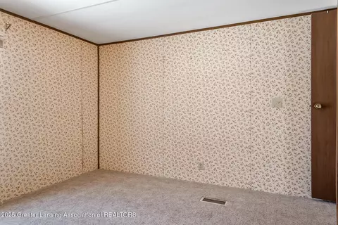 Bedroom - 501 Poplar St, Maple Rapids, MI 48853 photo 5 of 9