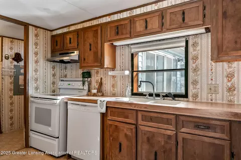 Kitchen - 501 Poplar St, Maple Rapids, MI 48853 photo 3 of 4