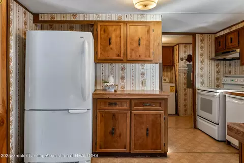 Kitchen - 501 Poplar St, Maple Rapids, MI 48853 photo 2 of 4