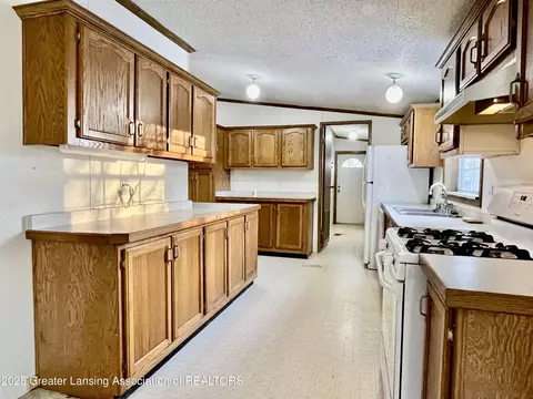 Kitchen - 110 N Morse St, Perrinton, MI 48871 photo 4 of 8