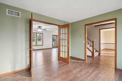 Living - 745 Tanbark Dr, Dimondale, MI 48821 photo 1 of 7