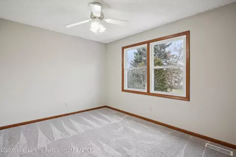 Bedroom - 745 Tanbark Dr, Dimondale, MI 48821 photo 5 of 7