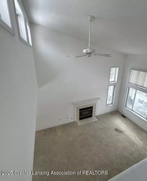 Living - 12813 Houghton Dr, Dewitt, MI 48820 photo 2 of 2