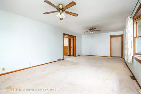 Living - 11740 Broadbent Rd, Lansing, MI 48917 photo 2 of 2