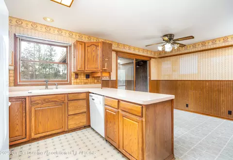 Kitchen - 11740 Broadbent Rd, Lansing, MI 48917 photo 2 of 2