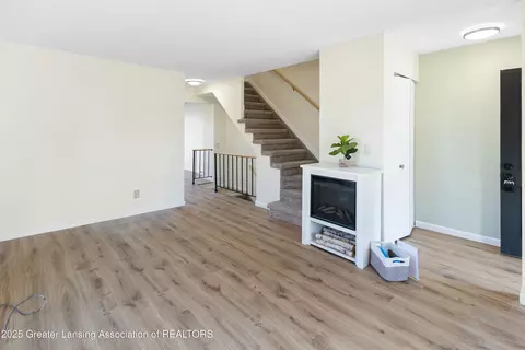 Living - 320 Park Meadows Dr, Lansing, MI 48917 photo 5 of 6