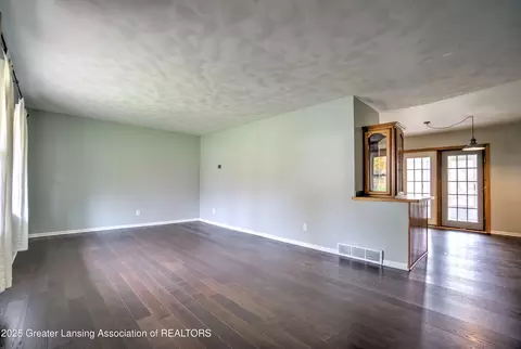 Living - 4518 Sandstone Dr, Williamston, MI 48895 photo 1 of 10